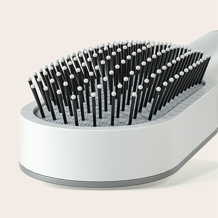 Self-Cleaning Hair Brush – One-Click Hair Removal & Scalp Massage Comb